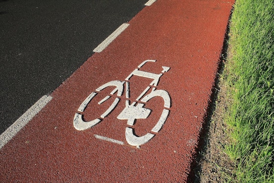 Fed-Up Boston Bikers Dig Out Comm Ave Themselves After City Delays