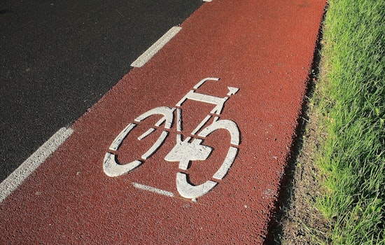 Fed-Up Boston Bikers Dig Out Comm Ave Themselves After City Delays