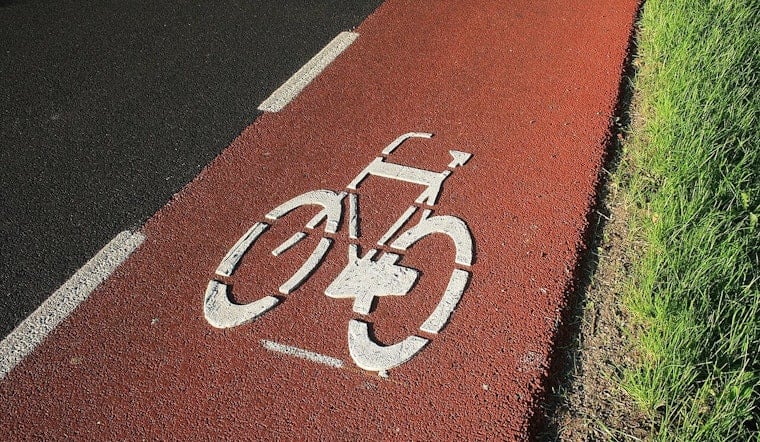Fed-Up Boston Bikers Dig Out Comm Ave Themselves After City Delays