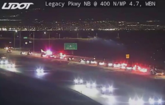 Four Walk Away After Small Plane Drops Onto Legacy Parkway