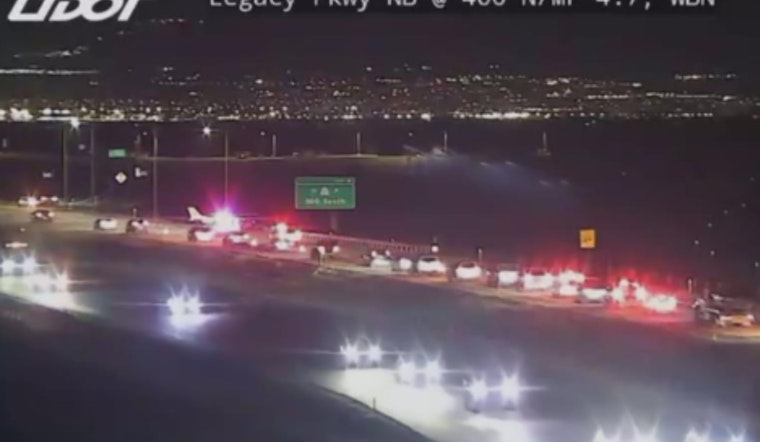 Four Walk Away After Small Plane Drops Onto Legacy Parkway