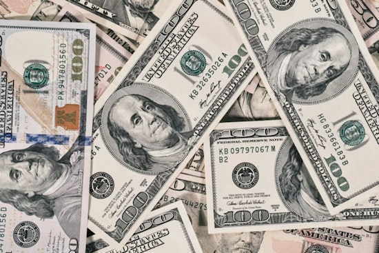 Local Money Pro Cracks $100 Million, Plants Flag In New Orleans Cotton Exchange