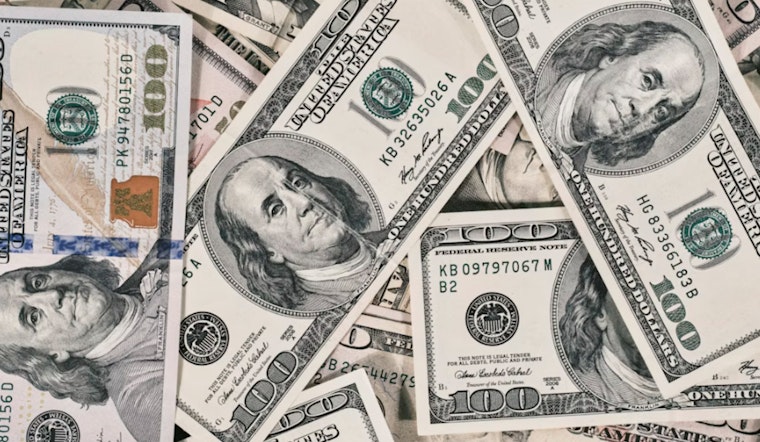 Local Money Pro Cracks $100 Million, Plants Flag In New Orleans Cotton Exchange