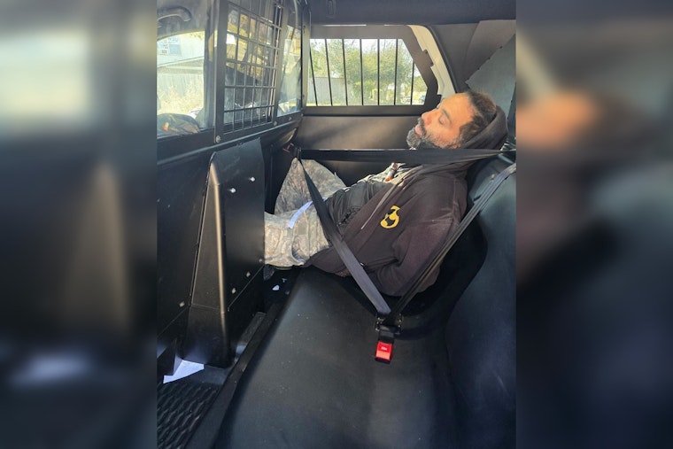 North Houston Street Swarmed as Deputies Seize Suspect in Child Porn Probe