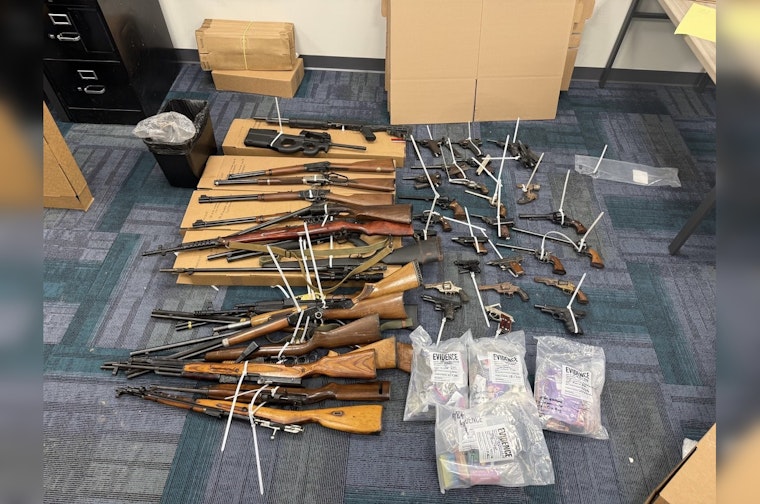 North Side Raid Haul, Indy Cops Nab 47 Guns And Two Suspects