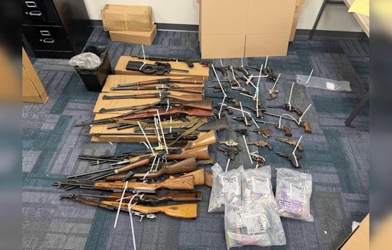 North Side Raid Haul, Indy Cops Nab 47 Guns And Two Suspects