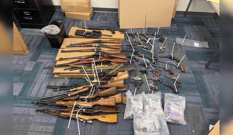 North Side Raid Haul, Indy Cops Nab 47 Guns And Two Suspects