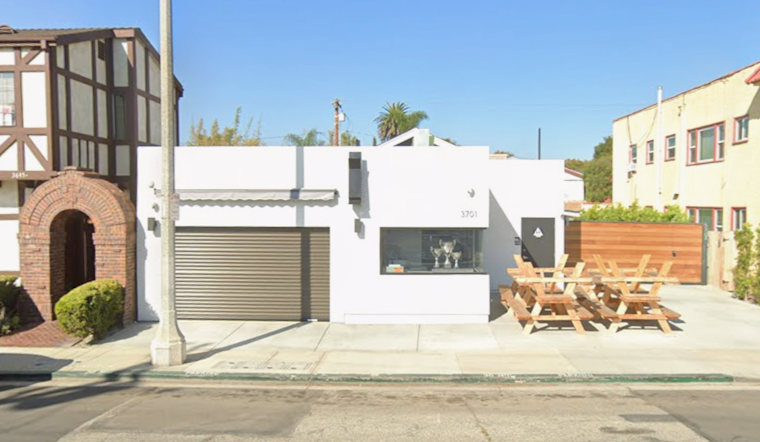 Tears, Smoke and Brisket as Mo Stewart Plants Texas BBQ Flag on Fourth Street