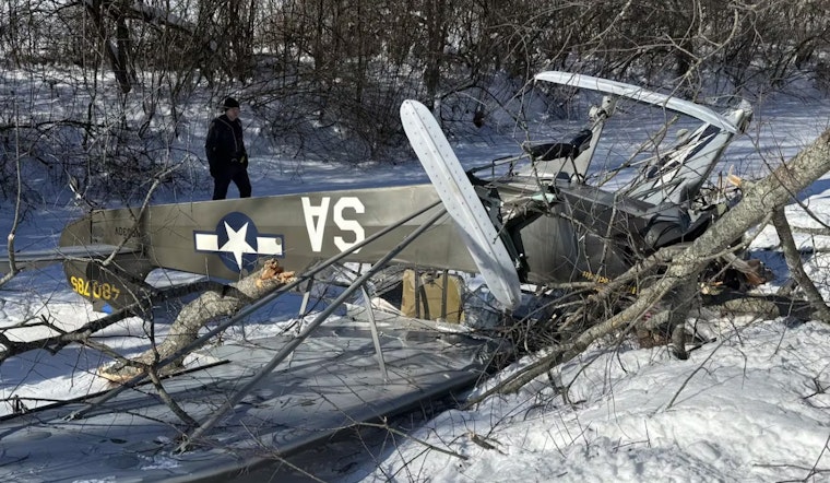 Two Injured as Vintage Piper Cub Plane Crash-Lands in Brimfield Township, Investigation Underway