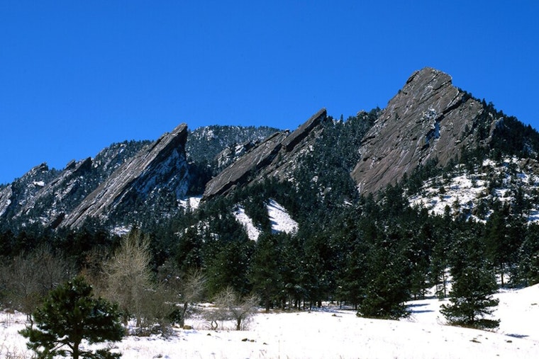 Boulder's First Flatiron Hit with 'Ice Out' Graffiti, Scrubbed in Minutes