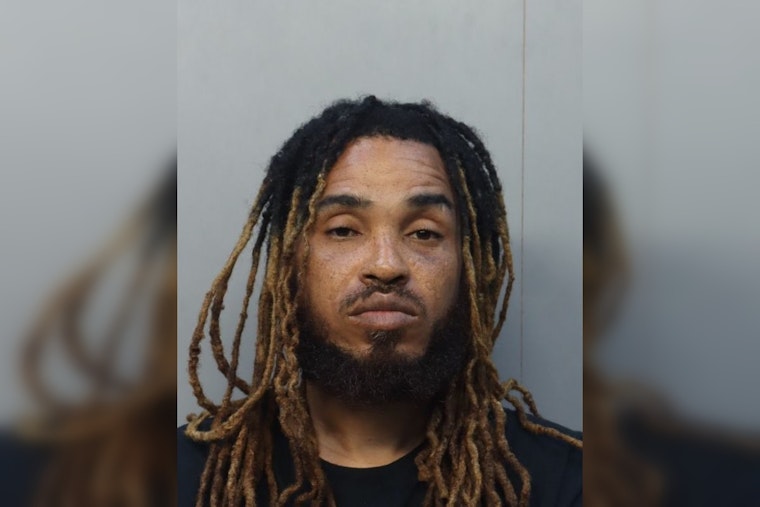Cops Say Wynwood Man Vaulted Into Tesla, Beat Lyft Driver In Downtown Showdown