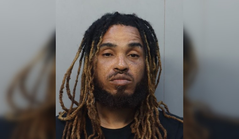 Cops Say Wynwood Man Vaulted Into Tesla, Beat Lyft Driver In Downtown Showdown