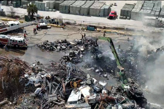 Massive Scrap Yard Inferno Darkens Skies Near Orlando Airport