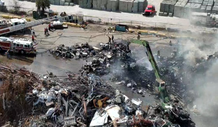 Massive Scrap Yard Inferno Darkens Skies Near Orlando Airport