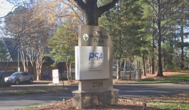 Stein Cuts Ribbon as PSA Jets Its HQ into Charlotte