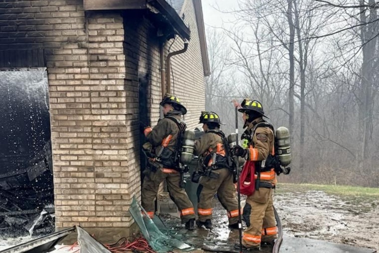 West Kemper Road Garage Inferno Boots Three Adults, Dog Pulled To Safety