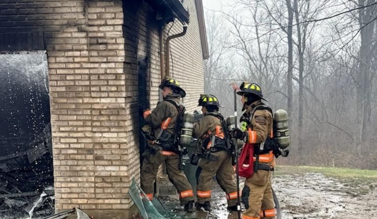 West Kemper Road Garage Inferno Boots Three Adults, Dog Pulled To Safety