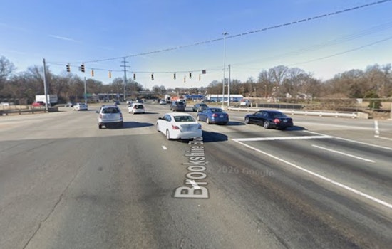 Daytime Brookshire Boulevard Shooting Leaves One Fighting For Life Near I-85