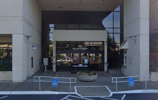 Eugene Climate Rebels Take Aim At Big-Box Cash With 2% Fee Push