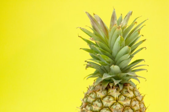 FiDi Goes Full Tropical as TNT Pineapple Plants Flag at 100 Pearl