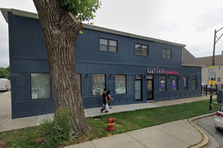 Pickup Slams Into 47th Street T‑Mobile, Leaves One Critically Hurt