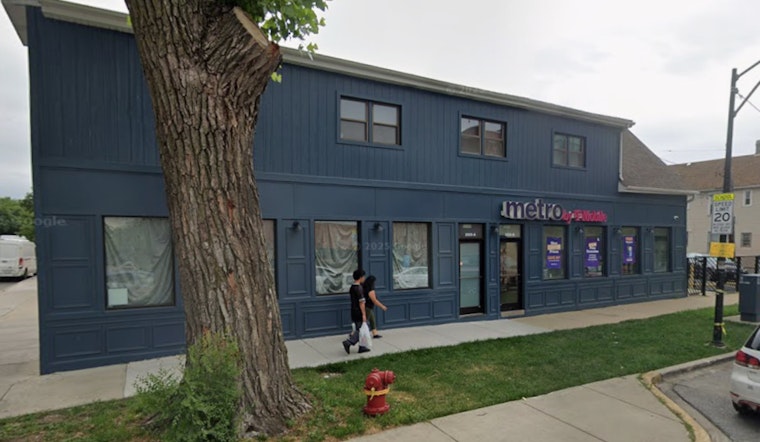 Pickup Slams Into 47th Street T‑Mobile, Leaves One Critically Hurt