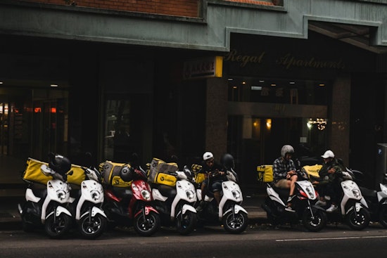 Seattle’s Big Delivery Pay Hike Vanishes Before Drivers See It