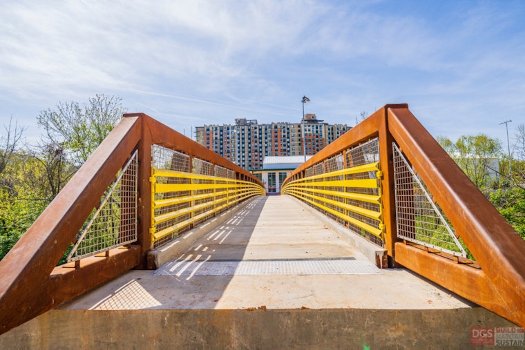 Ward 8 Tennis Scores Big as Oxon Run Bridge Beam Snaps Into Place