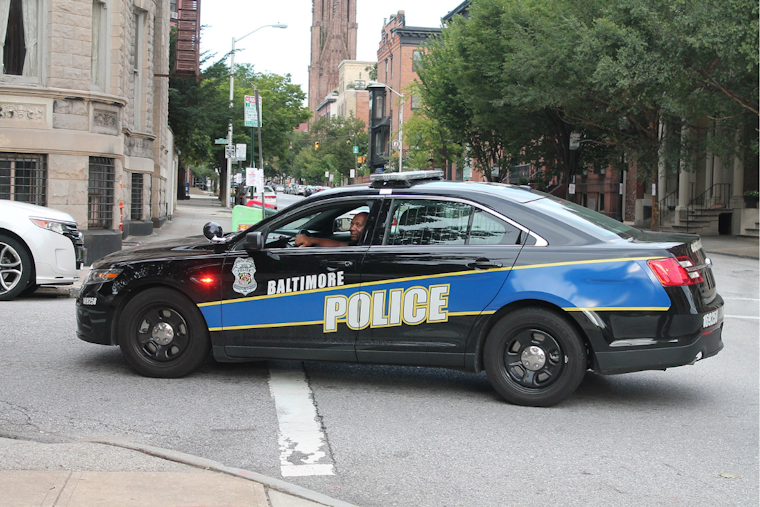 Baltimore Cop Benched over 'Action Junkie' Jab Hauls Brass into Court