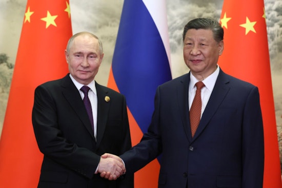 Beijing Rolls Out Red Carpet As Putin Follows Trump To Town