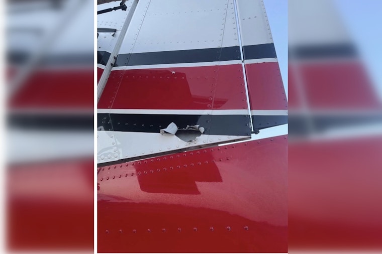Bullet Rips Fire Plane’s Tail As Pilot Scoops Lake Water Near Orr