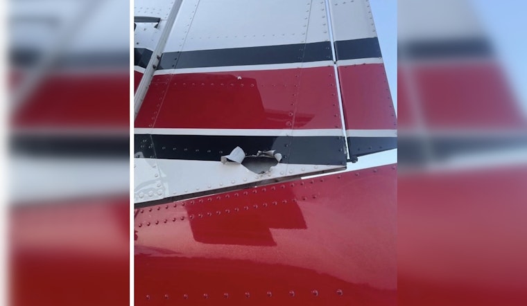 Bullet Rips Fire Plane’s Tail As Pilot Scoops Lake Water Near Orr