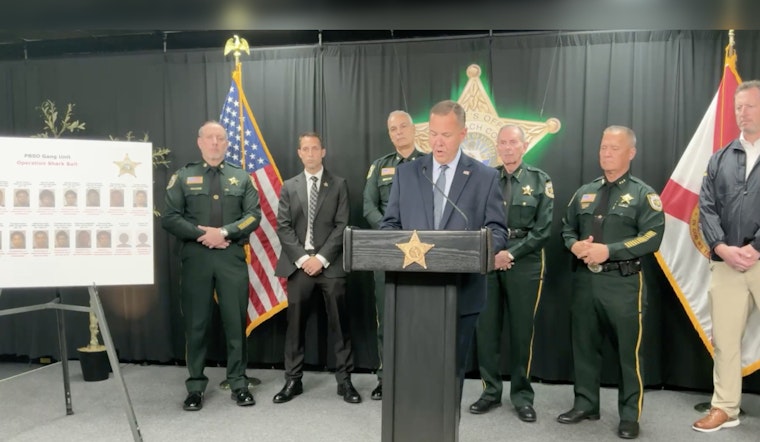 Cops Net 'Sharks' in Belle Glade Gang Raid, 20 Hauled Off