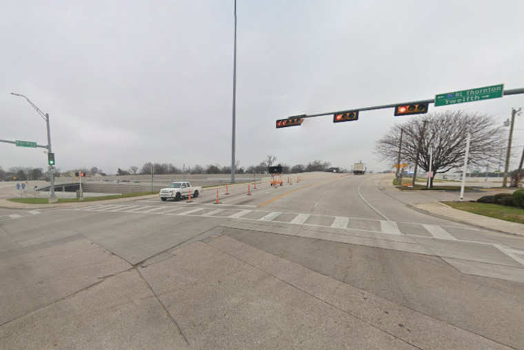 Dallas Freeway Chaos as Suspect Grabs Squad Car Wheel, Jumps Onto R.L. Thornton