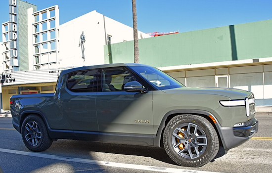 Fed-Up Denver Driver Plasters 'Don't Buy Junk' Warning On Rivian Outside Showroom
