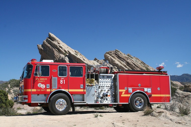 Fire Burns Under 110 Freeway In San Pedro