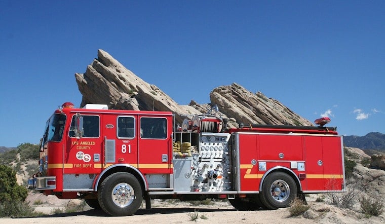Fire Burns Under 110 Freeway In San Pedro