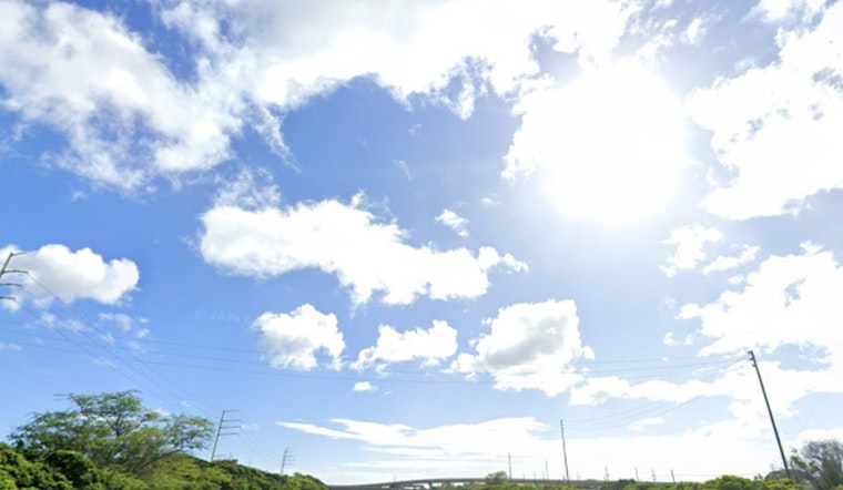 Honolulu Hunkers Down As Trade Winds Kick Up And Surf Climbs