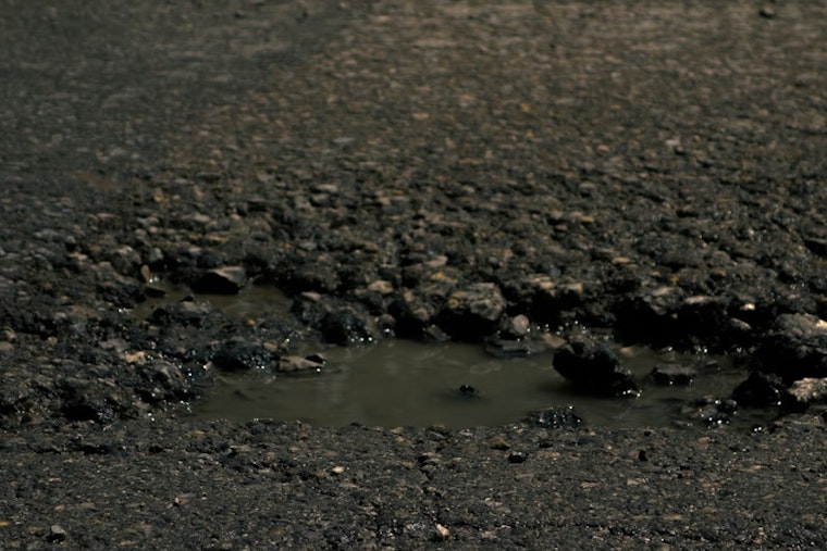 Millcreek Floats Road Fee as Potholes Turn Streets Into an Obstacle Course