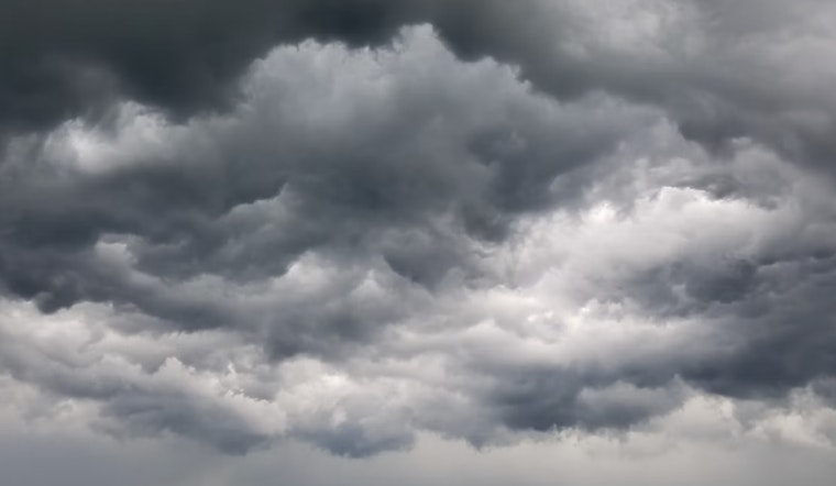 Muggy Skies And Street Flood Fears As Storms Linger Over New Orleans