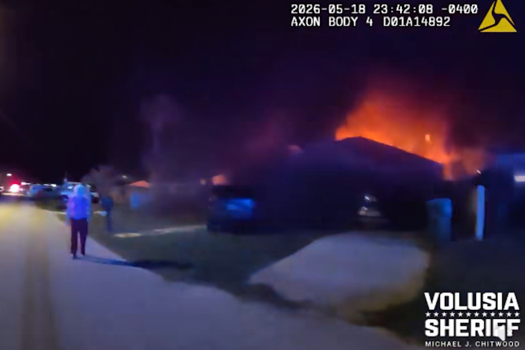Ormond Beach Cop Kicks In Door, Drags Two From Raging House Fire