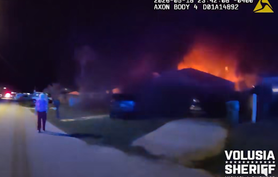 Ormond Beach Cop Kicks In Door, Drags Two From Raging House Fire