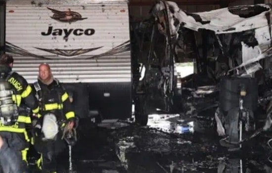 Progress Village Warehouse Blaze Swallows Two RVs, Spares Everyone Inside