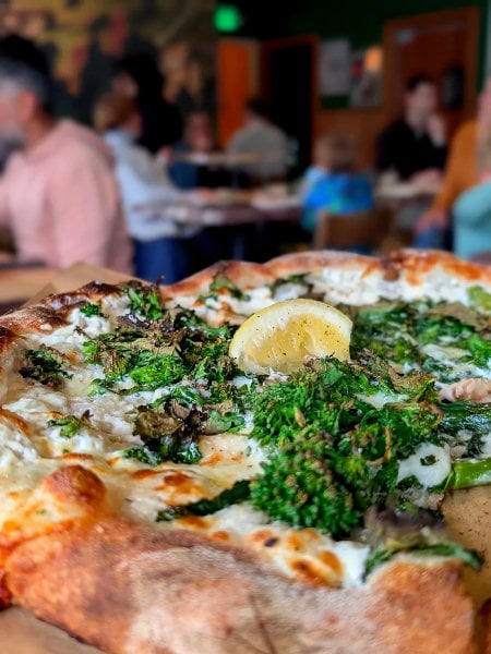 Green Deluxe pizza at Rose Pizzeria with broccoli rabe and lemon