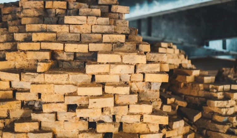 Seattle Mayor Fires Up Chainsaw To Open SoDo Salvaged Lumber Hub