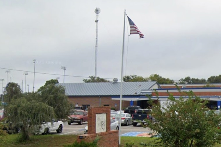 Shirtless Man With Billy Club Scales Interlachen School Fence During Lockdown