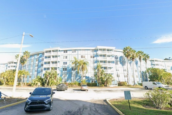 St. Pete Cherry Picker Topples, Flattens Parked Car Outside Wave Condos