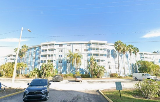 St. Pete Cherry Picker Topples, Flattens Parked Car Outside Wave Condos