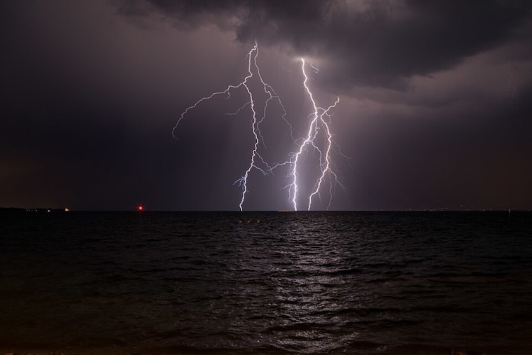Storm Train Targets New Orleans as Streets and Seas Brace for a Soaking