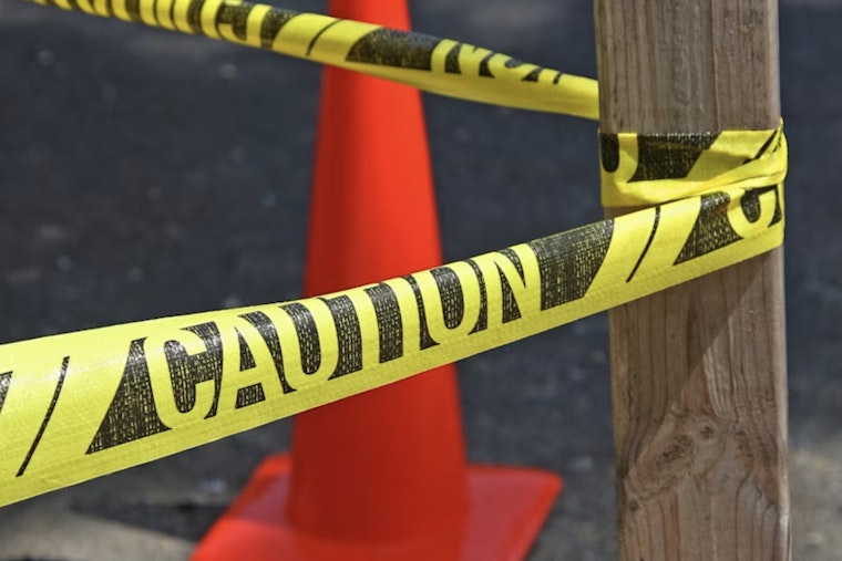 Sudden Downpour Rips Open Gaping Sinkhole On Quiet Decatur Block